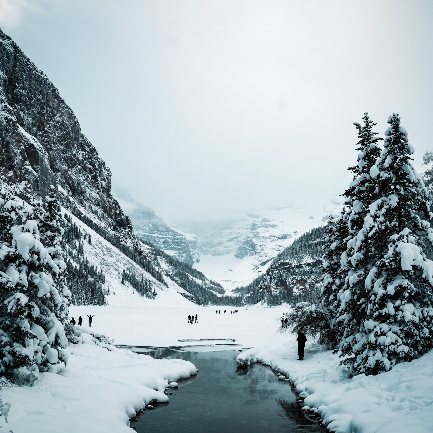 Snow-covered mountains and a river in Banff photographed by Harry Chapman